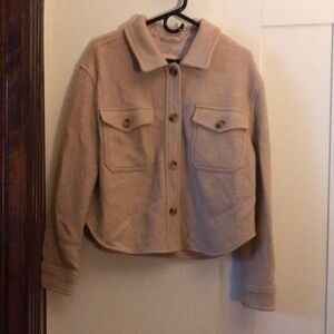 Vintage Levi’s jacket; great shape; trendy neutral shade
